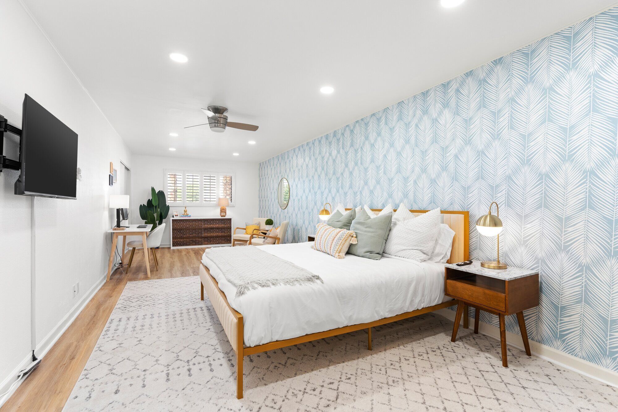 Open concept living space with turquoise accents at The Sundune Palm Springs