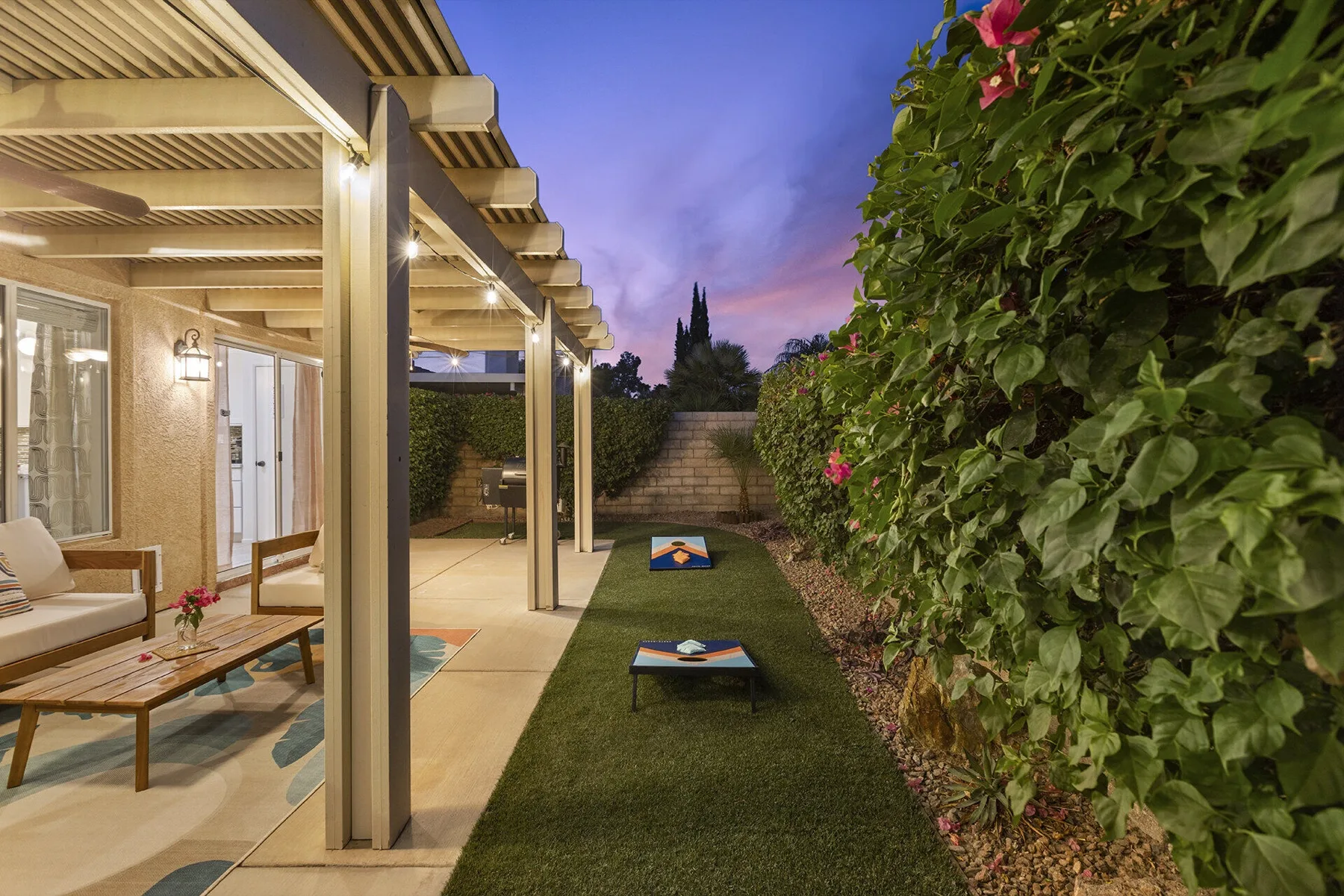 Backyard at Cozy Cactus vacation rental in Indio CA with outdoor seating
