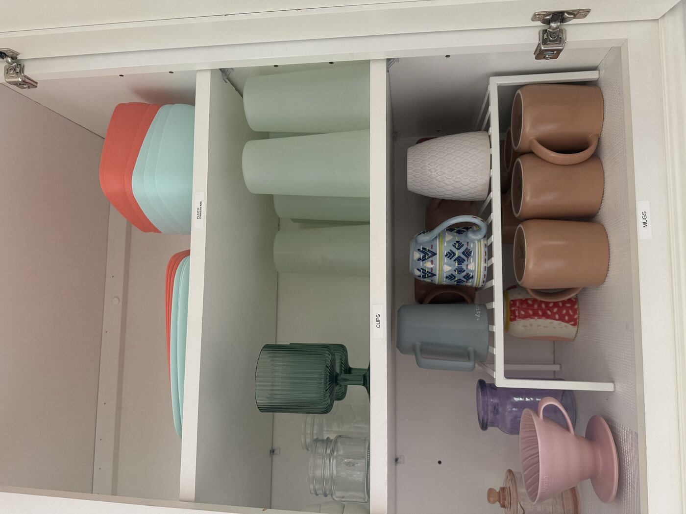 Organized kitchen drawers at The Cozy Cactus vacation rental in Indio California with labels for easy guest access