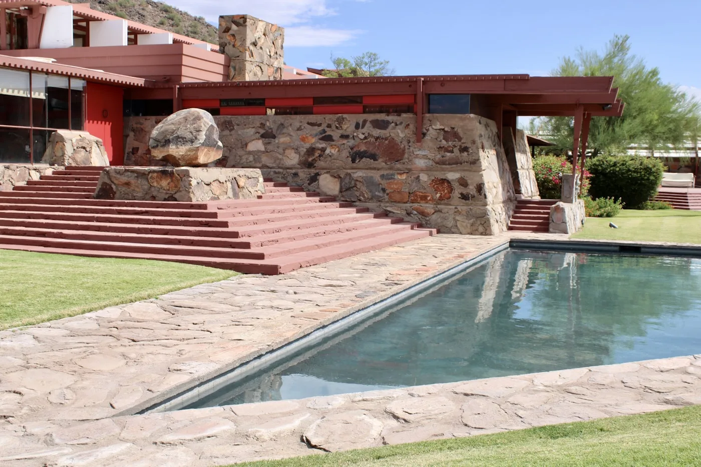 Scottsdale Arizona resort pool with desert landscaping for Palm Springs vs Scottsdale comparison