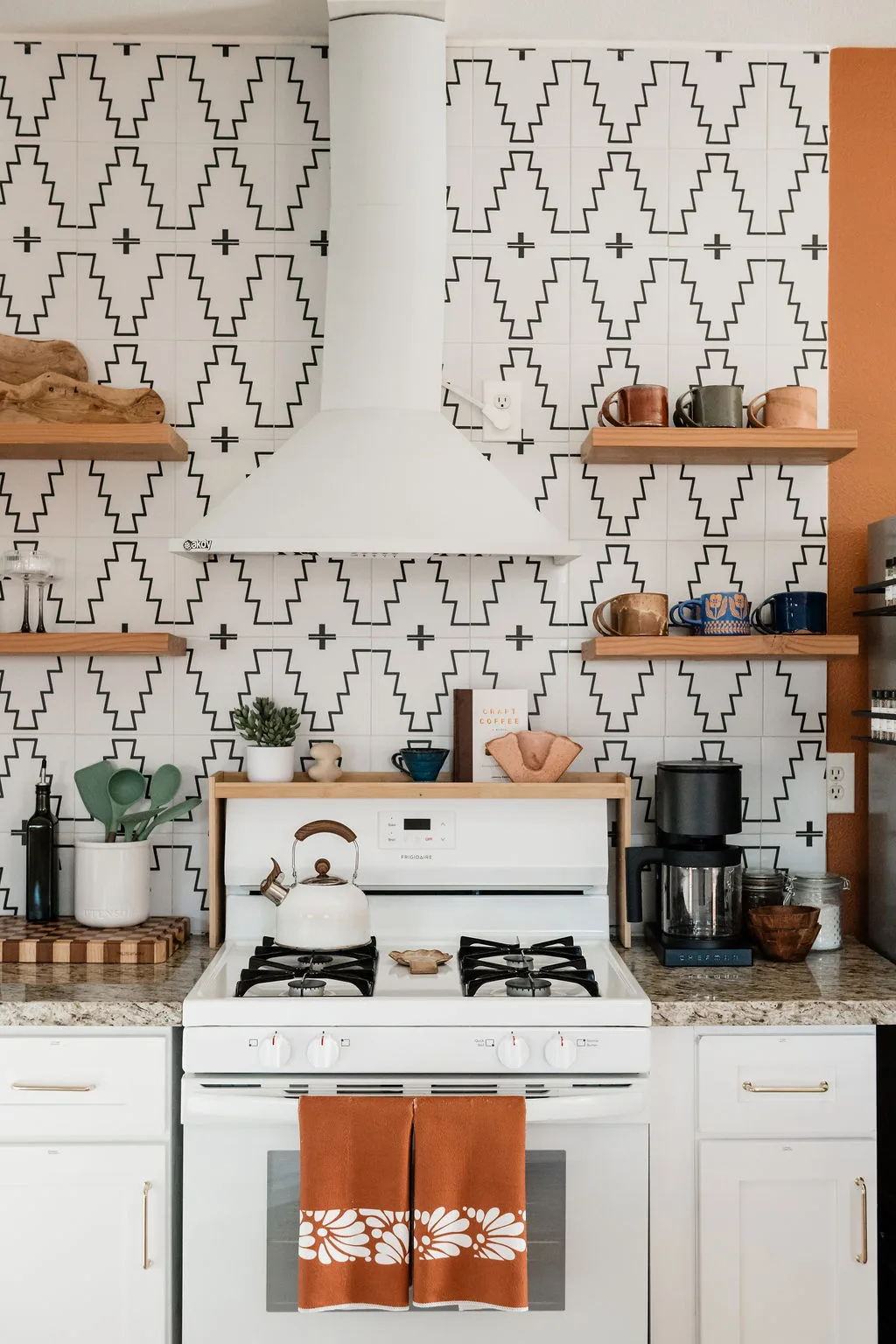 Terra Luz kitchen counter with terracotta backsplash and Chemex pour-over coffee setup