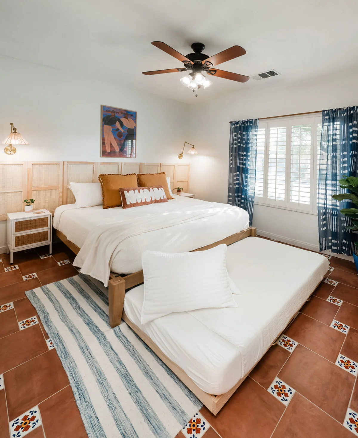 Terra Luz Cali Room bed with linen bedding and golden desert afternoon light