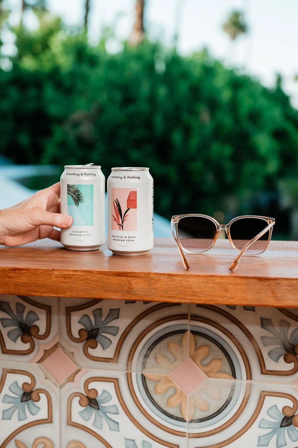 The Sundune Palm Springs balcony bar with Something and Nothing sodas on cement tile counter